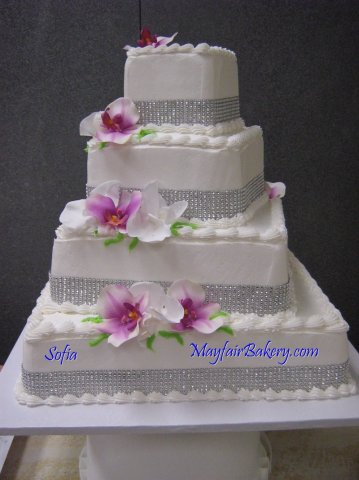 4 tier Sofia - 4 tier square with each tier turned slightly. Diamond glitter ribbon and flowers.4&quot;, 8&quot;, 12&quot;, 20&quot; tiers.&amp;nbsp;